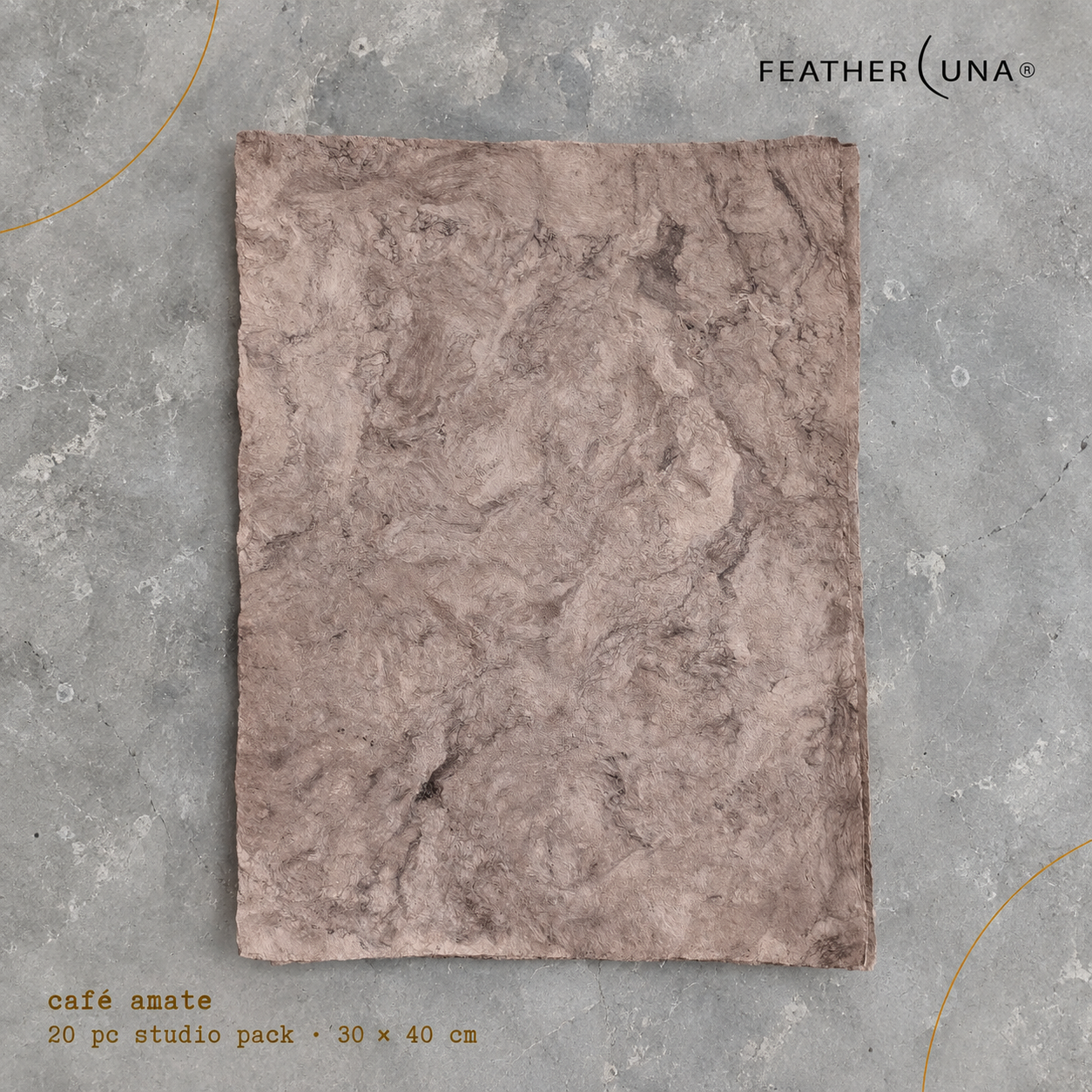 A single sheet of Café amate handmade bark paper laid flat, showing its full canvas size