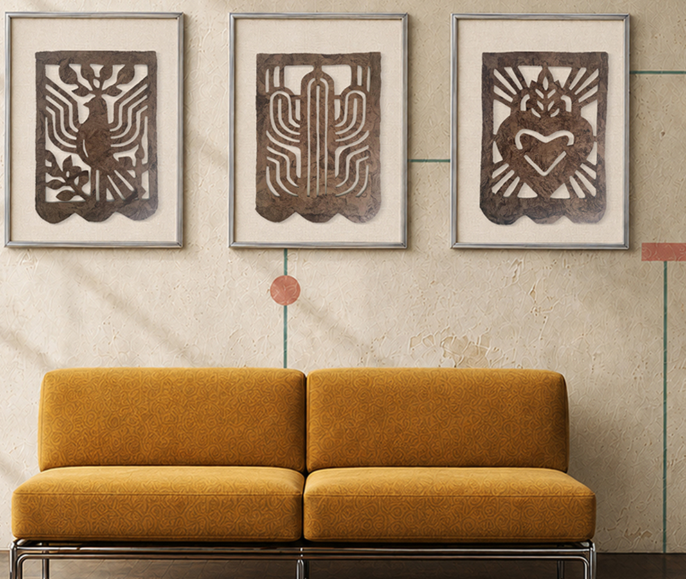 La Paloma, El Cactus and Corazón Sagrado framed on a wall