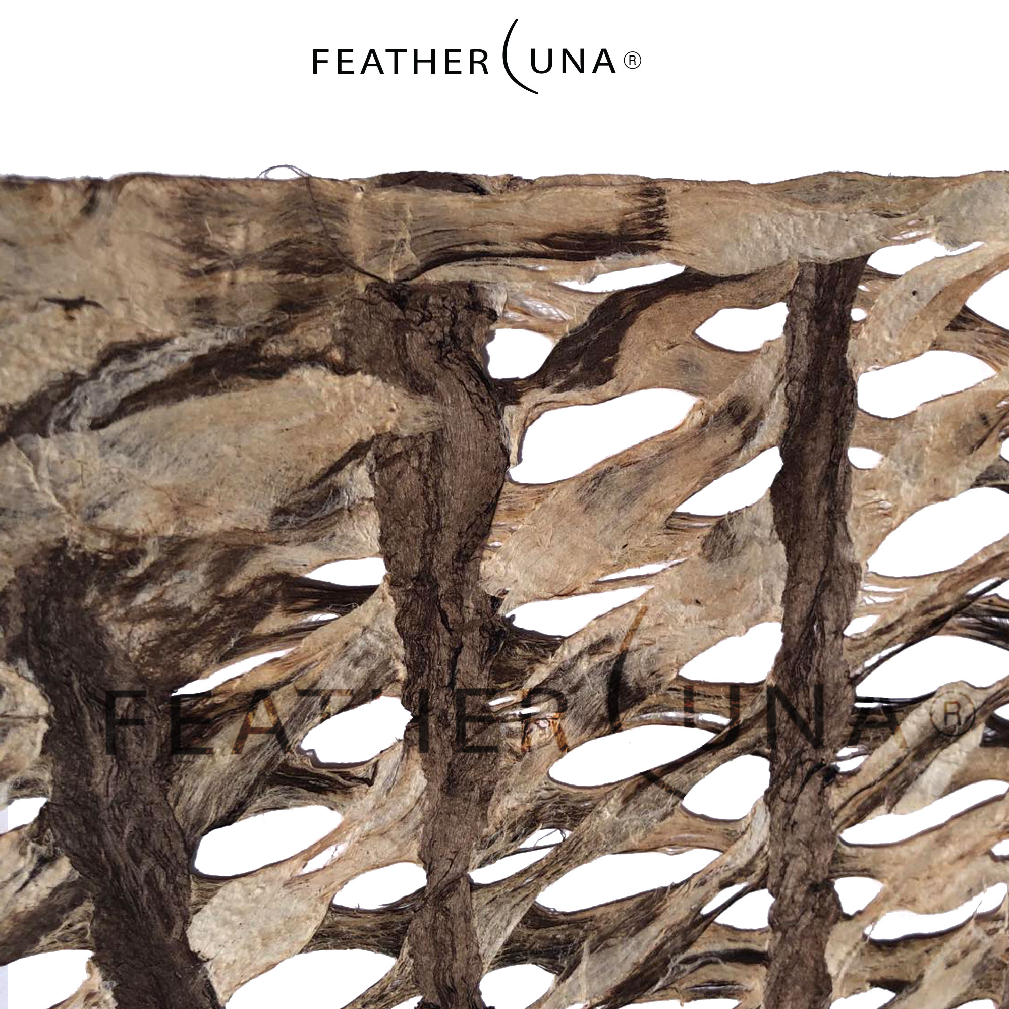 Close detail of Coco-Stripe amate paper, showing the open bark-fibre lattice and the dark stripes running through it